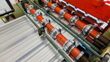 What is the difference between stamping and roll forming?